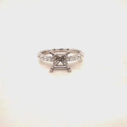 0.69 CTS T.W. WEDDING RING